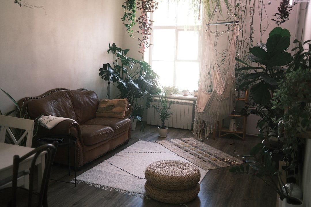Cozy home yoga corner with mat and plants
