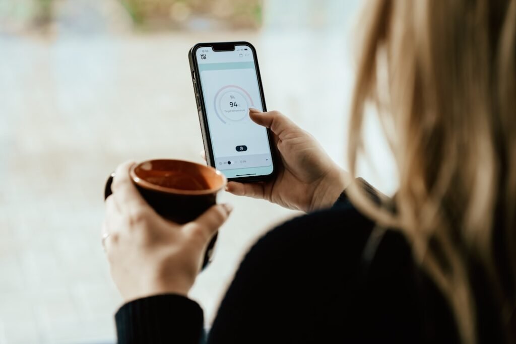 Meditation app open on a phone with headphones