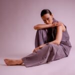 Confident plus-size yoga practitioner in studio