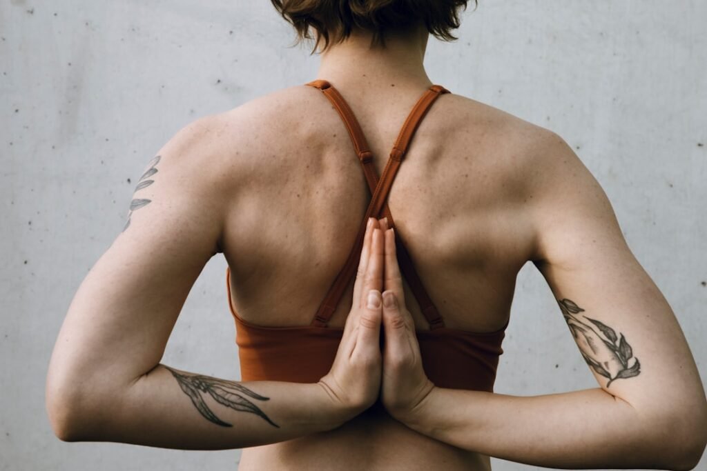 Minimal neutral yoga sports bra on a hanger