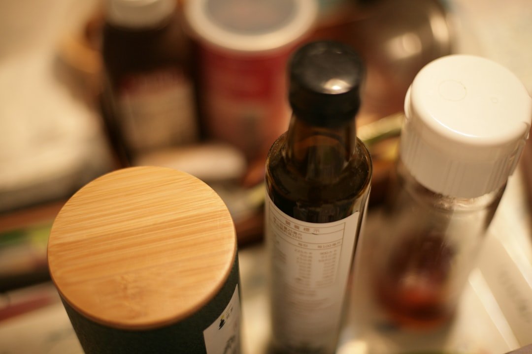 Supplement bottles on a minimal kitchen counter
