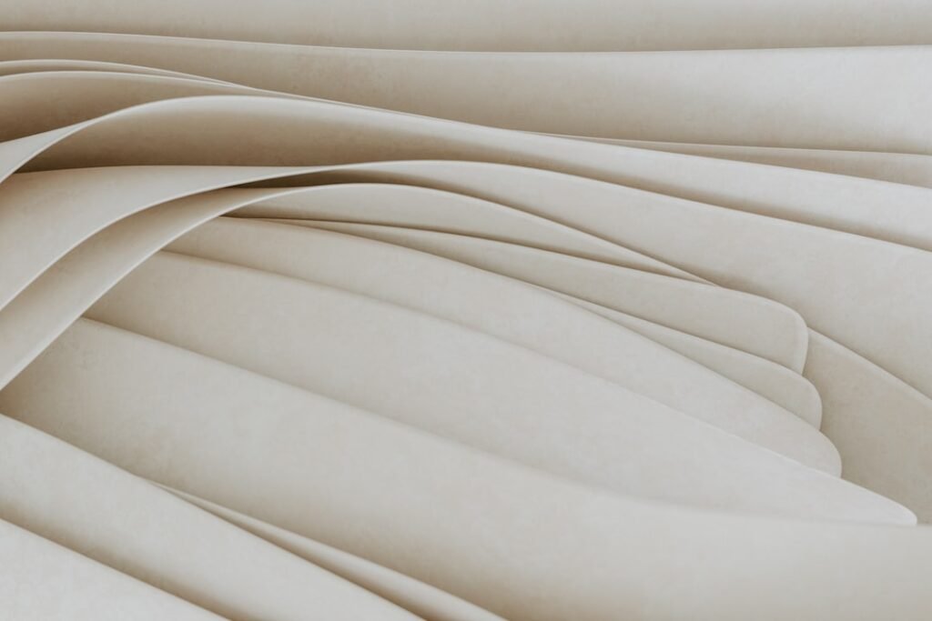 Sustainable activewear folded in earth tones